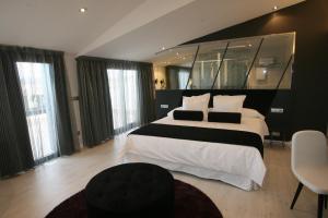 Posteľ alebo postele v izbe v ubytovaní Hotel Cardenal