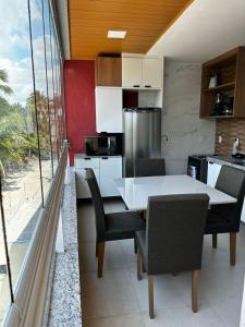 Køkken eller tekøkken på Condomínio Jardim dos Coqueiros