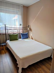 Postel nebo postele na pokoji v ubytování Kecelhegyi Vendégház
