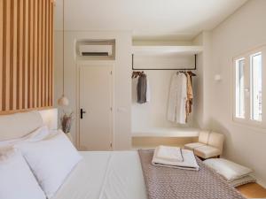 Ένα ή περισσότερα κρεβάτια σε δωμάτιο στο SELINOE The Ultimate Experience