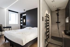 Postel nebo postele na pokoji v ubytování L'Esplanade + 18 fotografií