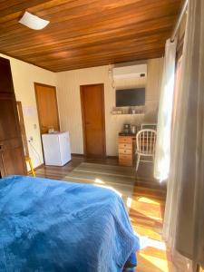 Postel nebo postele na pokoji v ubytování Suite 391 - Quarto privativo em casa