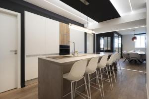 Kuchyň nebo kuchyňský kout v ubytování L'Esplanade