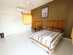 Postel nebo postele na pokoji v ubytování Hotel D’Cural