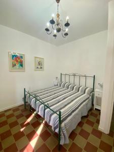 Giường trong phòng chung tại Villa Fontana 56