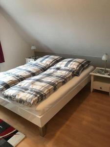 Postel nebo postele na pokoji v ubytování Ferienwohnung-Thekla