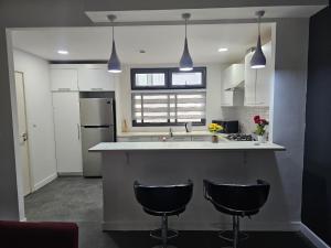 ครัวหรือมุมครัวของ Luxury Park Valley