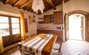 Kuchyň nebo kuchyňský kout v ubytování Agriturismo Il Caggio