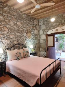 Ένα ή περισσότερα κρεβάτια σε δωμάτιο στο La casa de Eni