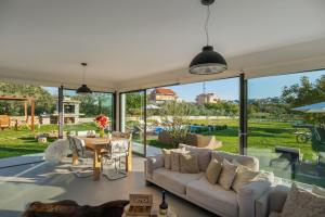 Posedenie v ubytovaní Luxury Villa Luminosa