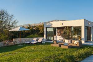 Vonkajšia záhrada v ubytovaní Luxury Villa Luminosa