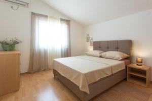 Postel nebo postele na pokoji v ubytování House Dupla