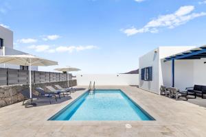 Bazén v ubytování Lanzarote Villa Volcan 7 nebo v jeho okolí
