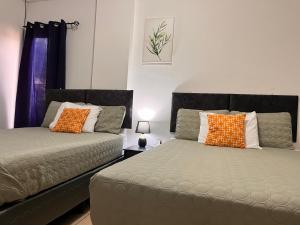 Postel nebo postele na pokoji v ubytování Apartamentos Trebol