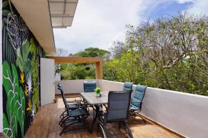 Balkón nebo terasa v ubytování Relaxing comfortable jungle view Eklum Villa Rivera Maya Puerto Morelos POOL AC GYM GATED COMMUNITY