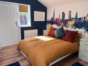 Ένα ή περισσότερα κρεβάτια σε δωμάτιο στο Waterside Cottage