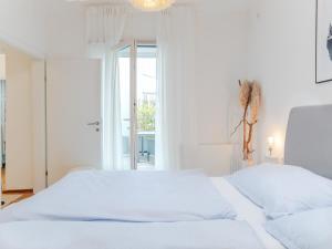 A bed or beds in a room at TheMarketFlat Schöne Wohnung im Stadtzentrum