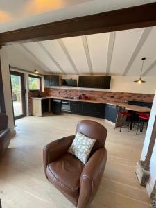 a living room with a couch and a table at Gite Marie Rose in Sainte-Marie-aux-Mines +21 photos