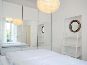 A bed or beds in a room at TheMarketFlat Schöne Wohnung im Stadtzentrum