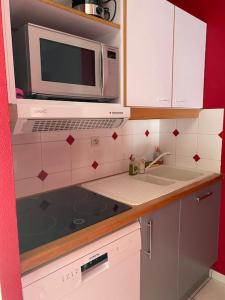 Η κουζίνα ή μικρή κουζίνα στο Ravissante maison en bord de mer +15 φωτογραφίες