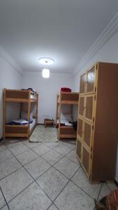 Postel nebo postele na pokoji v ubytování Afgo Hostel