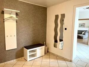 Postel nebo postele na pokoji v ubytování Ferienwohnung Weserliebe zu Ohsen in Emmerthal