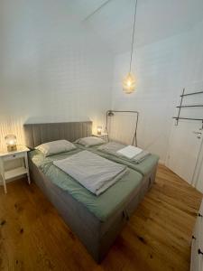 Postel nebo postele na pokoji v ubytování NINOA holidays + 35 fotografií