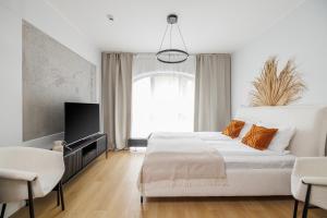Aparthotel City Break Plac Wolności 6客房内的一张或多张床位