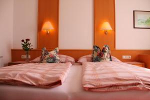 Postel nebo postele na pokoji v ubytování Haus Seeschwalbe
