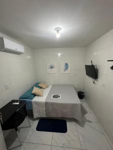 Istumisnurk majutusasutuses Cantinho Aconchegante - Quarto 04 Ar-condicionado