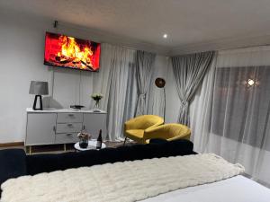 Postel nebo postele na pokoji v ubytování HomelyVest Guesthouse