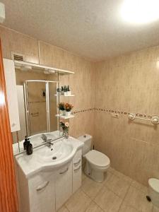 A bathroom at Seabreeze Lighthouse Apartment