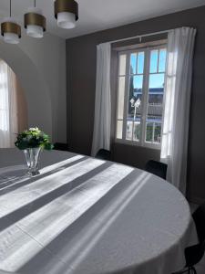 Posteľ alebo postele v izbe v ubytovaní Maison de maître Les toiles à Elise