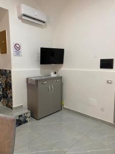 TV o dispositivi per l'intrattenimento presso Le 3 Sorelle House