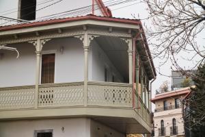 a balcony on the side of a building at Crystal Hotel Tbilisi in Tbilisi City
