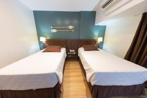 Postel nebo postele na pokoji v ubytování Hotel Village Premium Joao Pessoa