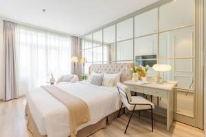 Voodi või voodid majutusasutuse Keypad Hotel - Nhân Hòa toas