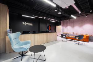 Aparthotel City Break Plac Wolności 6的休息区