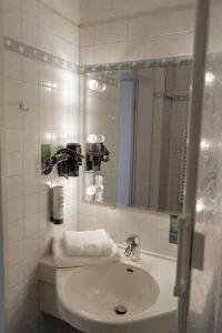 Ein Badezimmer in der Unterkunft Hotel Klusenhof