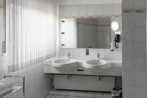 Ein Badezimmer in der Unterkunft Hotel Klusenhof