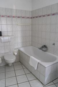 Ein Badezimmer in der Unterkunft Hotel Klusenhof