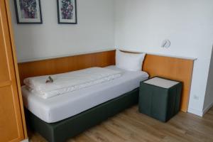 Ein Bett oder Betten in einem Zimmer der Unterkunft Hotel Klusenhof