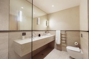 Vannituba majutusasutuses Aparthotel Craiova