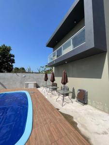 Gallery image of Apto com piscina perto da praia! in Bertioga