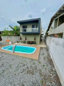 Gallery image of Apto com piscina perto da praia! in Bertioga
