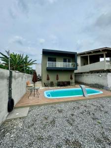 Gallery image of Apto com piscina perto da praia! in Bertioga