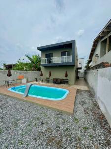 Gallery image of Apto com piscina perto da praia! in Bertioga