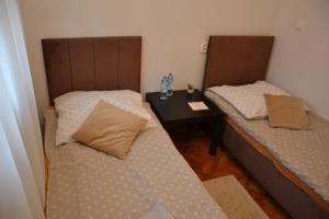 Posteľ alebo postele v izbe v ubytovaní Apartament i pokoje Szalawa