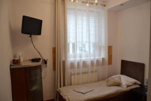 Posteľ alebo postele v izbe v ubytovaní Apartament i pokoje Szalawa