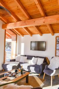 Posezení v ubytování Résidence Le Bettex - Charmant Chalet de village à 300m des pistes MAE-8721